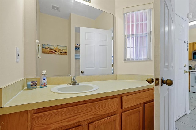 bathroom featuring vanity and tile patterned floors