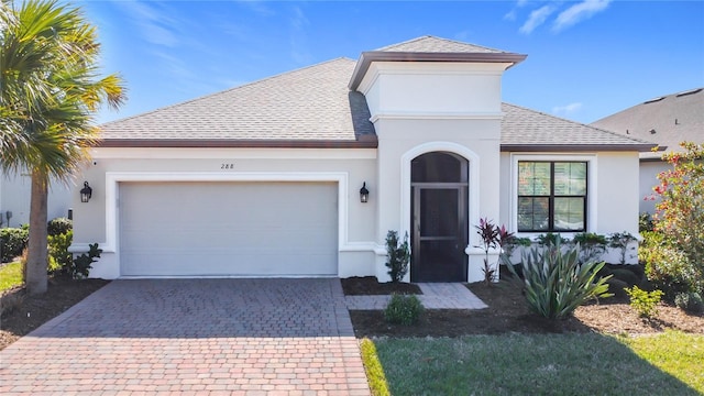 view of front of house with a garage