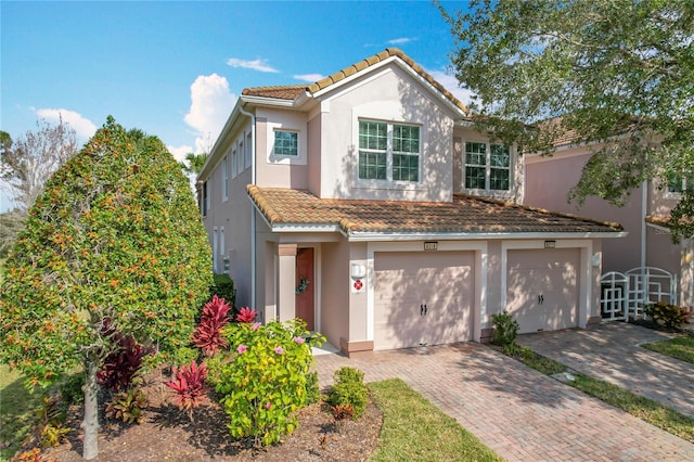 view of front of property featuring a garage