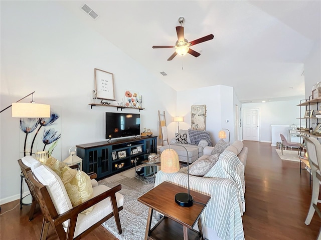 living room featuring vaulted ceiling, hardwood / wood-style floors, and ceiling fan