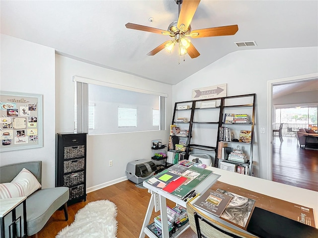 office with ceiling fan, vaulted ceiling, and hardwood / wood-style floors