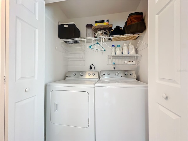 laundry room with independent washer and dryer