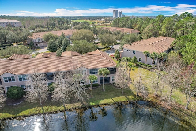 drone / aerial view with a water view