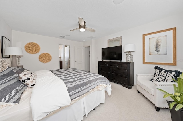 bedroom with light carpet and ceiling fan