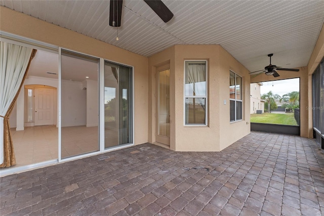 view of patio / terrace featuring ceiling fan