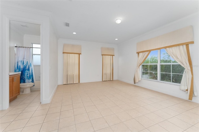 4010 Navigator Way, Kissimmee, FL 34746 - unfurnished bedroom with ornamental molding, light tile patterned floors, recessed lighting, and ensuite bathroom