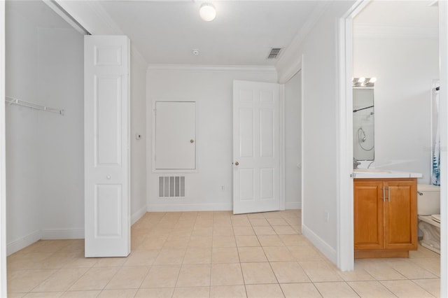 4010 Navigator Way, Kissimmee, FL 34746 - full bath with ornamental molding, vanity, tile patterned floors, a closet, and a shower