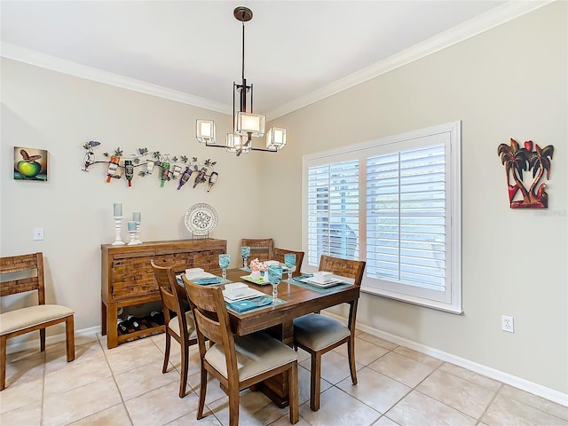 dining area featuring light tile patterned floors, ornamental molding, and a chandelier