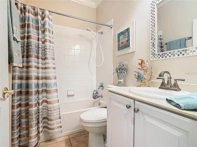 full bathroom with tile patterned floors, toilet, shower / bath combo with shower curtain, and vanity