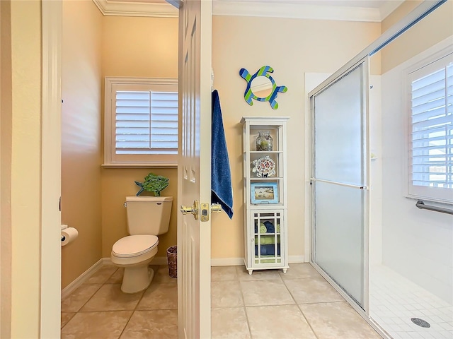 bathroom with tile patterned flooring, an enclosed shower, crown molding, and toilet