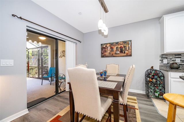 dining area featuring hardwood / wood-style floors