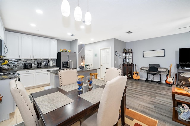 dining area featuring light hardwood / wood-style flooring