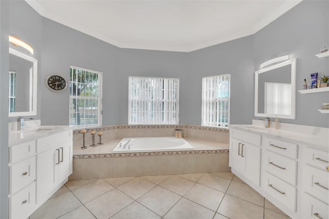 bathroom with tile patterned flooring, vanity, ornamental molding, and tiled bath