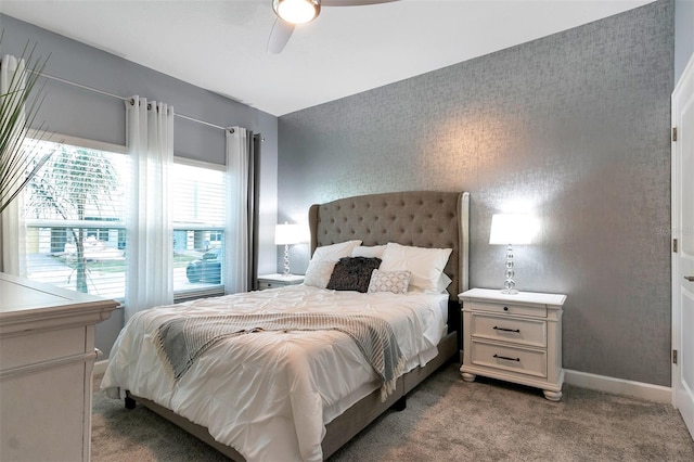 carpeted bedroom featuring ceiling fan