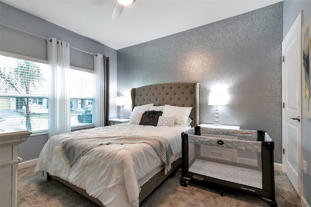 carpeted bedroom with ceiling fan