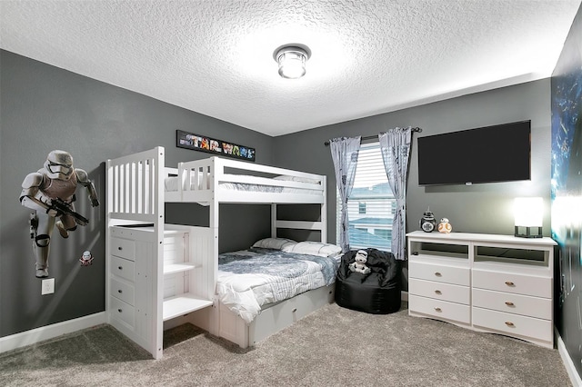 carpeted bedroom with a textured ceiling