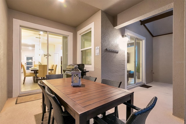 view of carpeted dining area