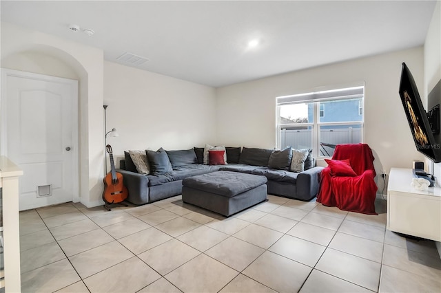 living room featuring light tile patterned flooring