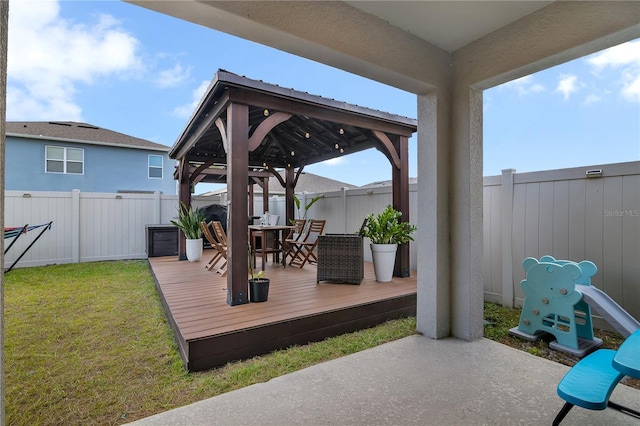 exterior space with a gazebo and a deck