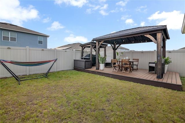 view of yard featuring a gazebo and a deck