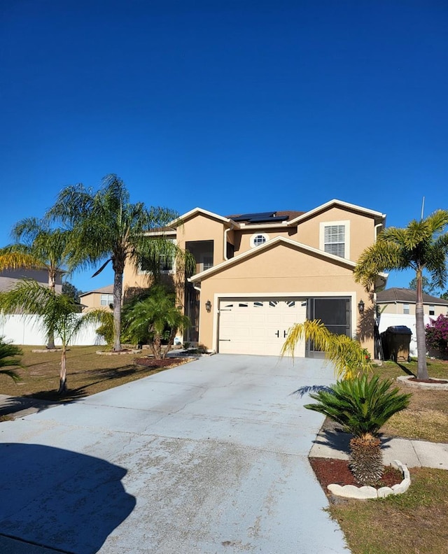 view of front of property with solar panels