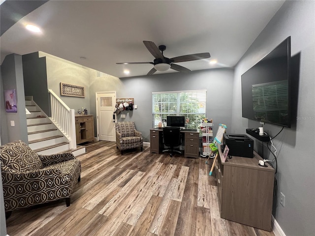 home office with hardwood / wood-style floors and ceiling fan