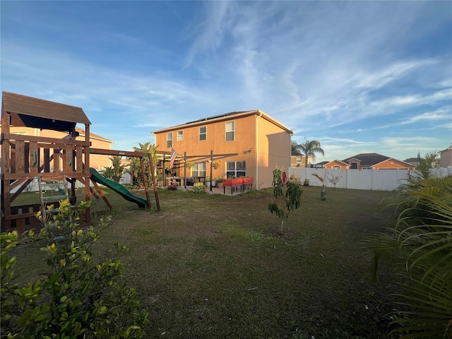 view of play area with a yard