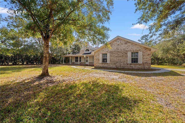 exterior space featuring a porch and a front lawn