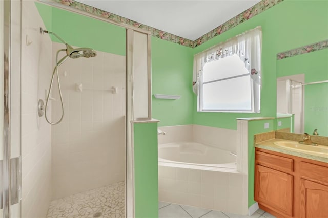 bathroom featuring vanity, tile patterned floors, and independent shower and bath