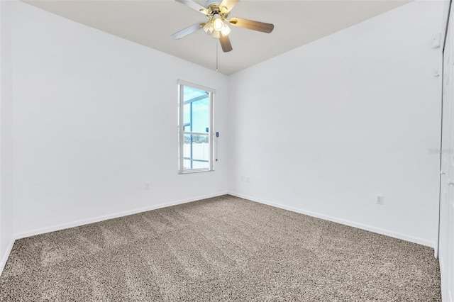 empty room with carpet and ceiling fan