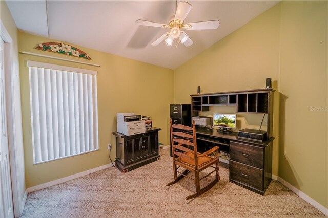 office with vaulted ceiling, light colored carpet, and ceiling fan