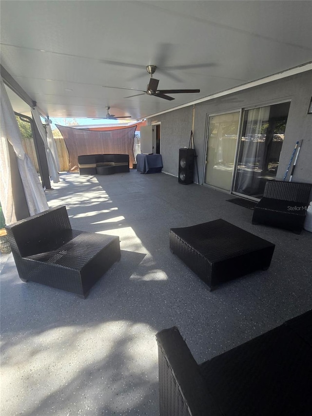 view of patio / terrace featuring ceiling fan and outdoor lounge area