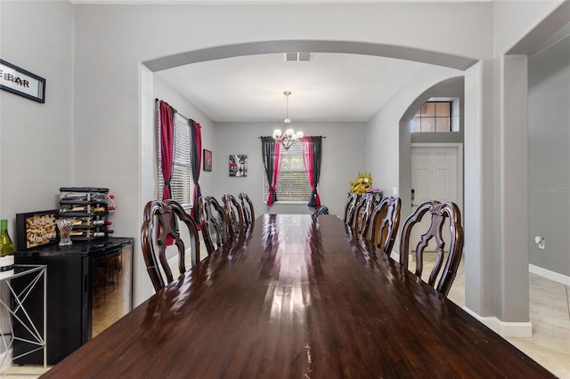 dining room with a chandelier