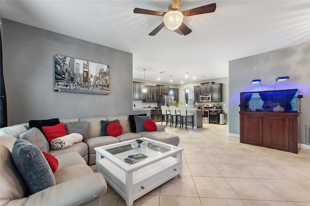 tiled living room with ceiling fan