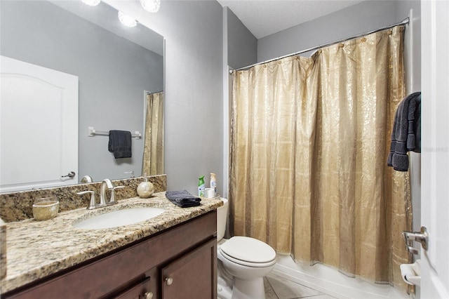 full bathroom featuring shower / bath combination with curtain, vanity, tile patterned floors, and toilet