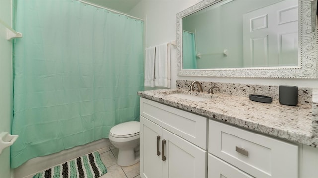 bathroom with a shower with shower curtain, vanity, toilet, and tile patterned flooring