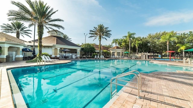 view of swimming pool featuring a patio