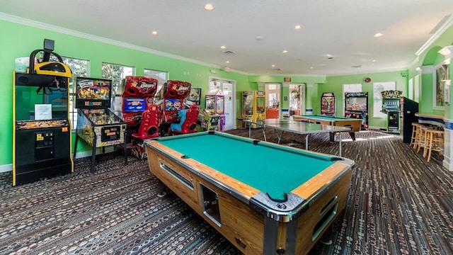 recreation room featuring pool table, ornamental molding, dark carpet, and plenty of natural light