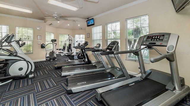 exercise room featuring ceiling fan, ornamental molding, and dark colored carpet