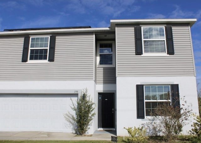 view of front property featuring a garage