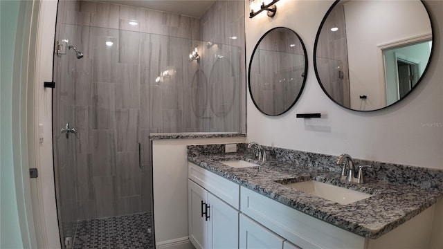 bathroom with vanity and an enclosed shower