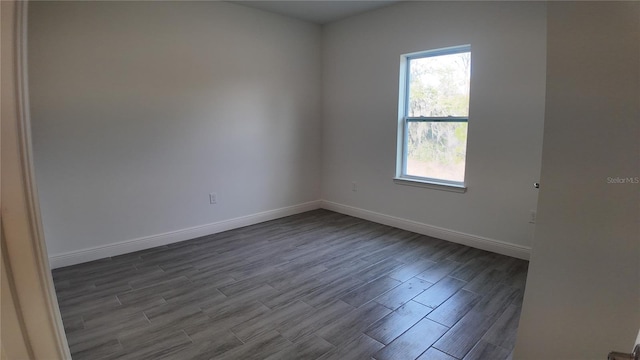 unfurnished room featuring hardwood / wood-style floors