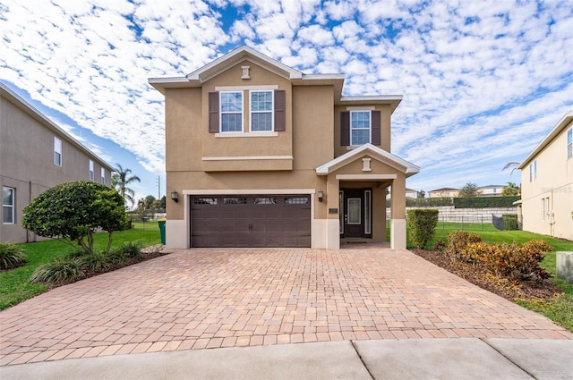 view of front of property with a garage