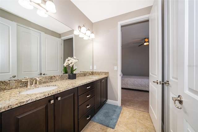 bathroom with vanity and tile patterned floors