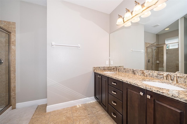 bathroom featuring walk in shower and vanity