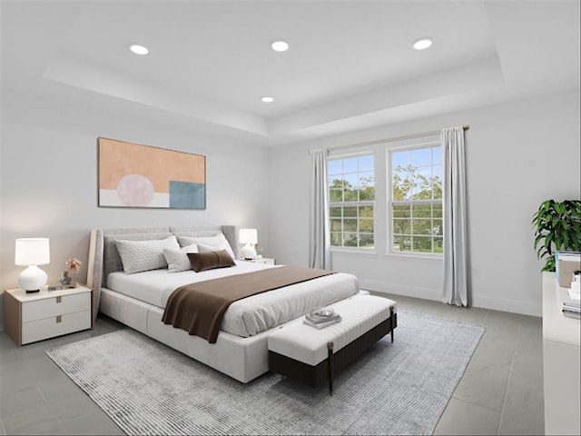 bedroom featuring a raised ceiling