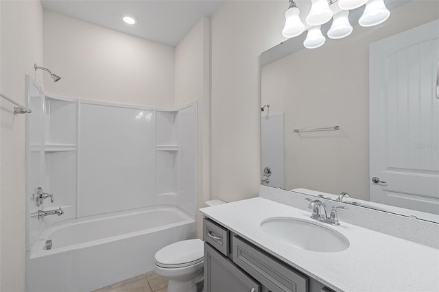 full bathroom with vanity, bathtub / shower combination, tile patterned floors, and toilet