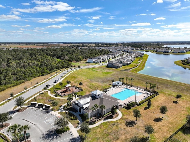 birds eye view of property featuring a water view