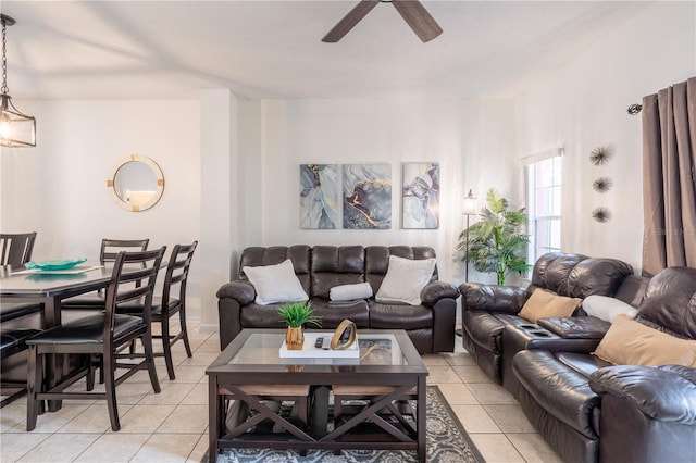 living room with light tile patterned floors and ceiling fan