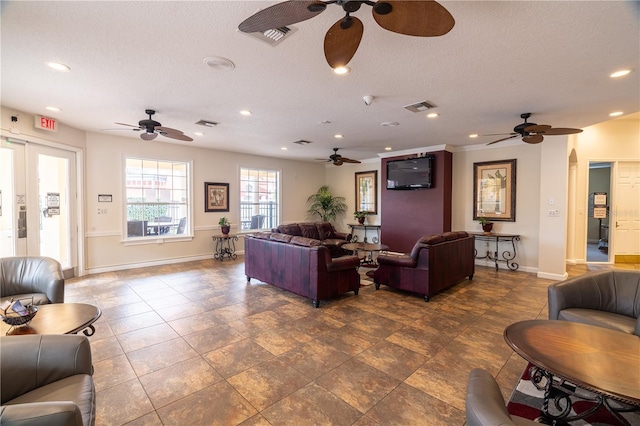 living room featuring a textured ceiling